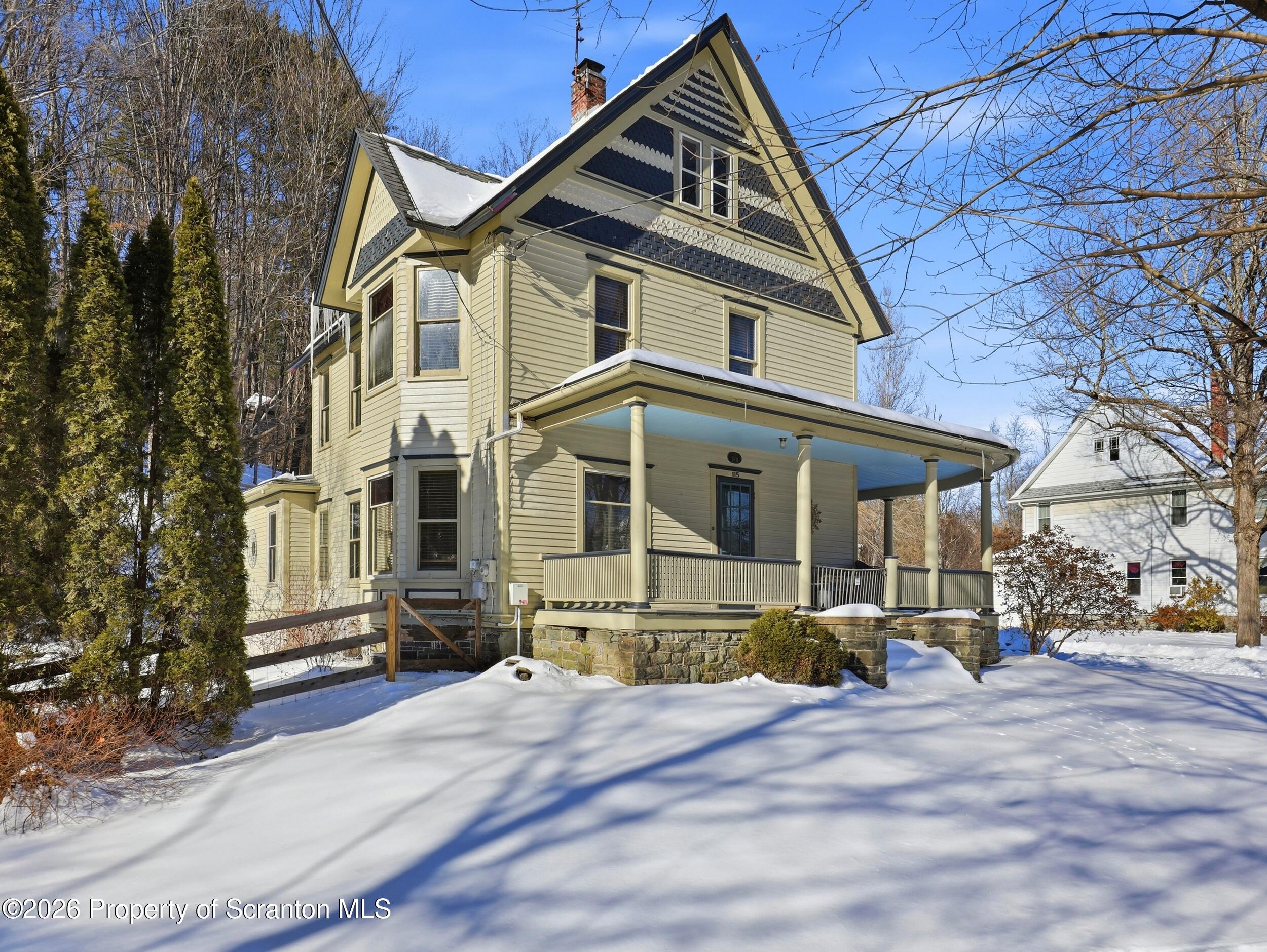 115 State Street Nicholson, PA 18446 - Photo 4 of 29 a front view of a house with a yard