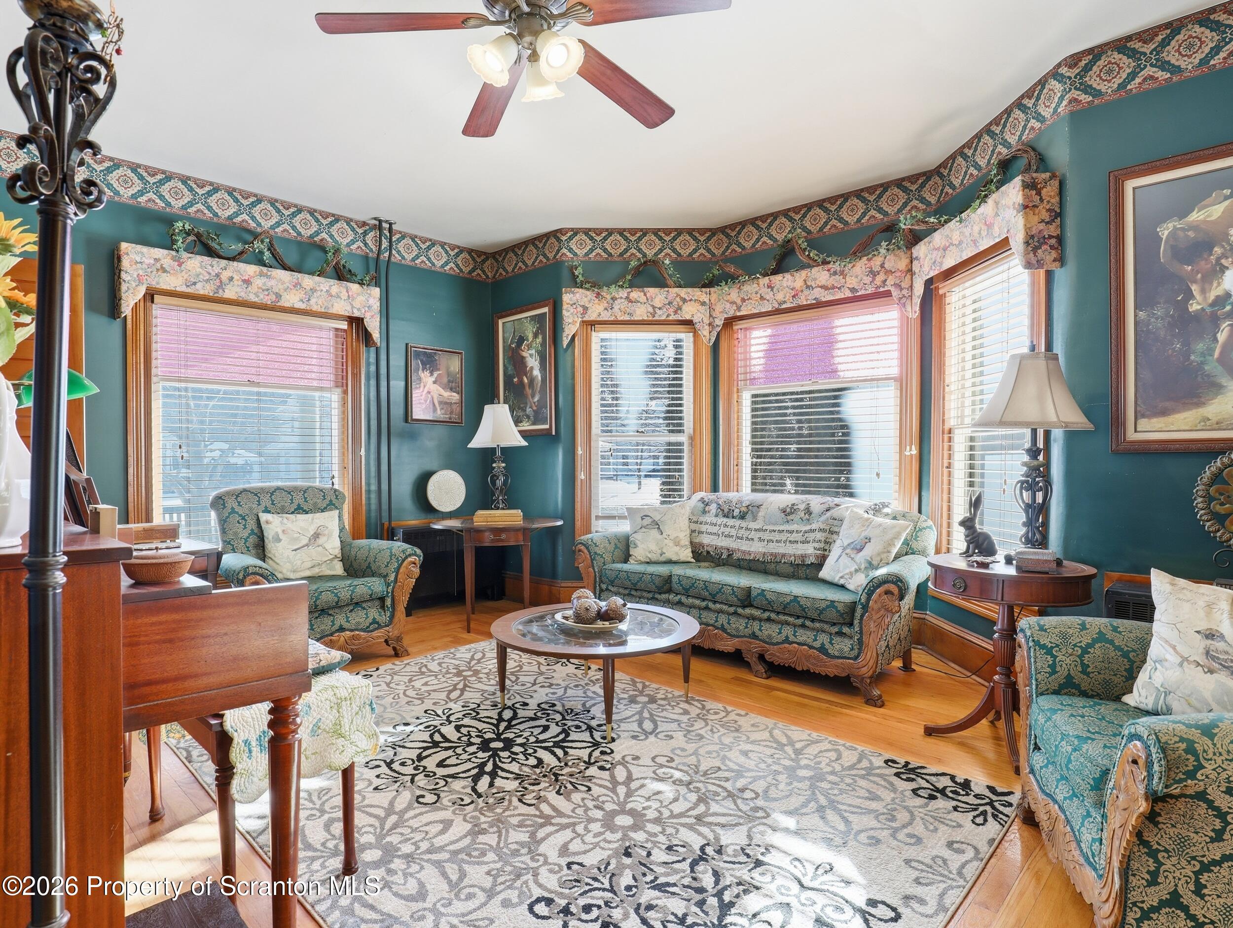 115 State Street Nicholson, PA 18446 - Photo 5 of 29 a living room with furniture and a large window