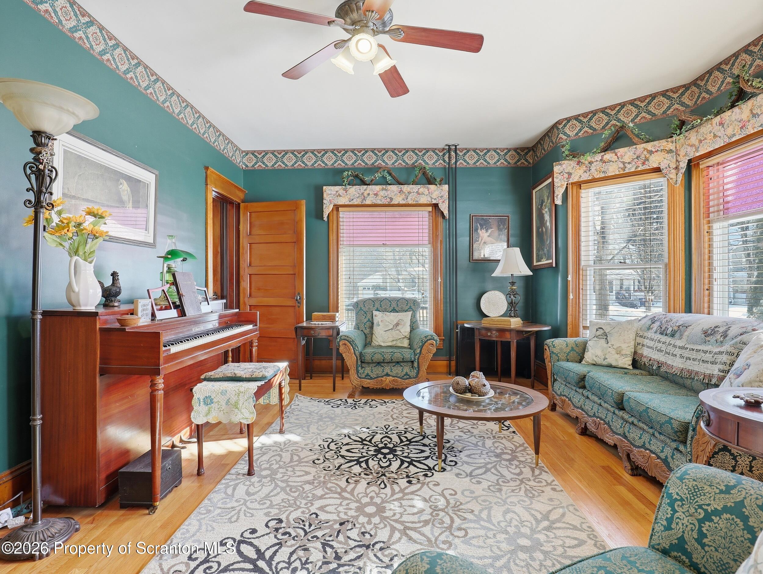115 State Street Nicholson, PA 18446 - Photo 6 of 29 a living room with furniture and a large window