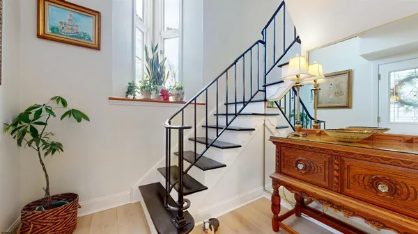 a kitchen with stainless steel appliances granite countertop refrigerator sink and cabinets