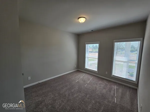 a bathroom with a sink a toilet and bathtub