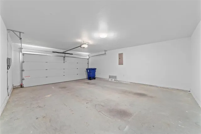 a view of an empty room with windows