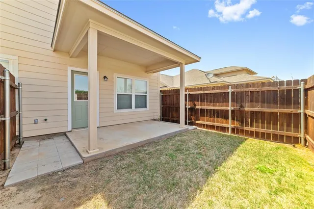 a view of swimming pool with a yard