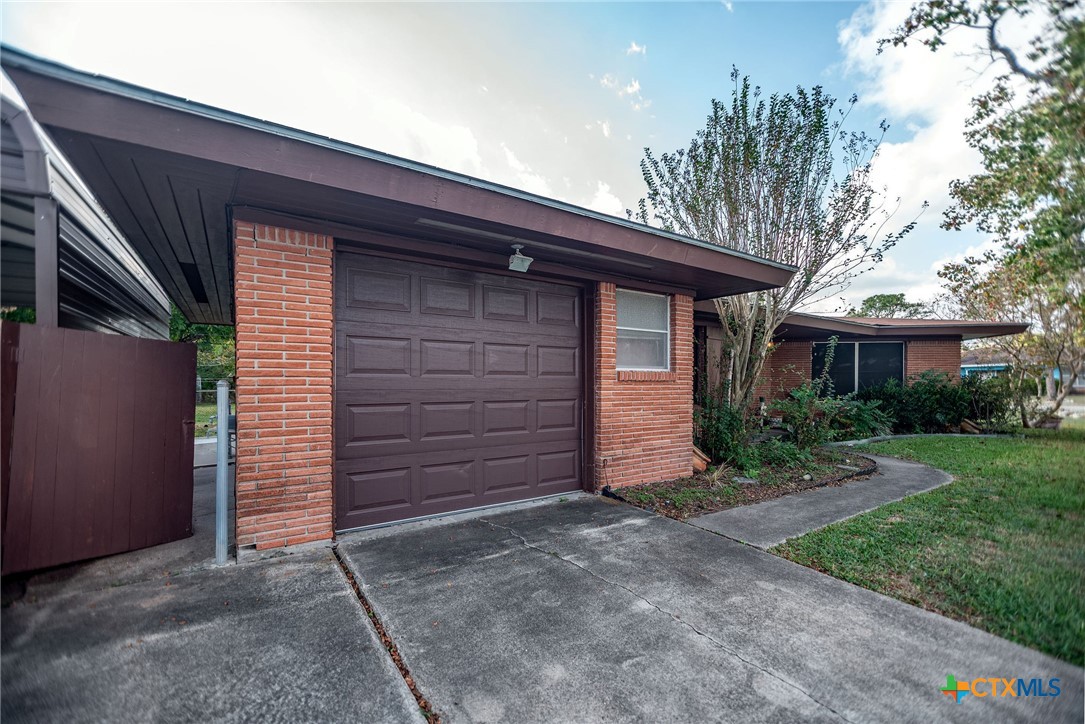 218 Burnet Street Port Lavaca, TX 77979 - Photo 21 of 23 a front view of a house with a yard