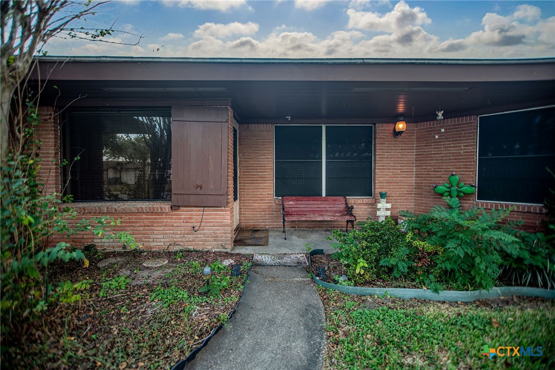 218 Burnet Street Port Lavaca, TX 77979 - Photo 3 of 23 a front view of a house with garden