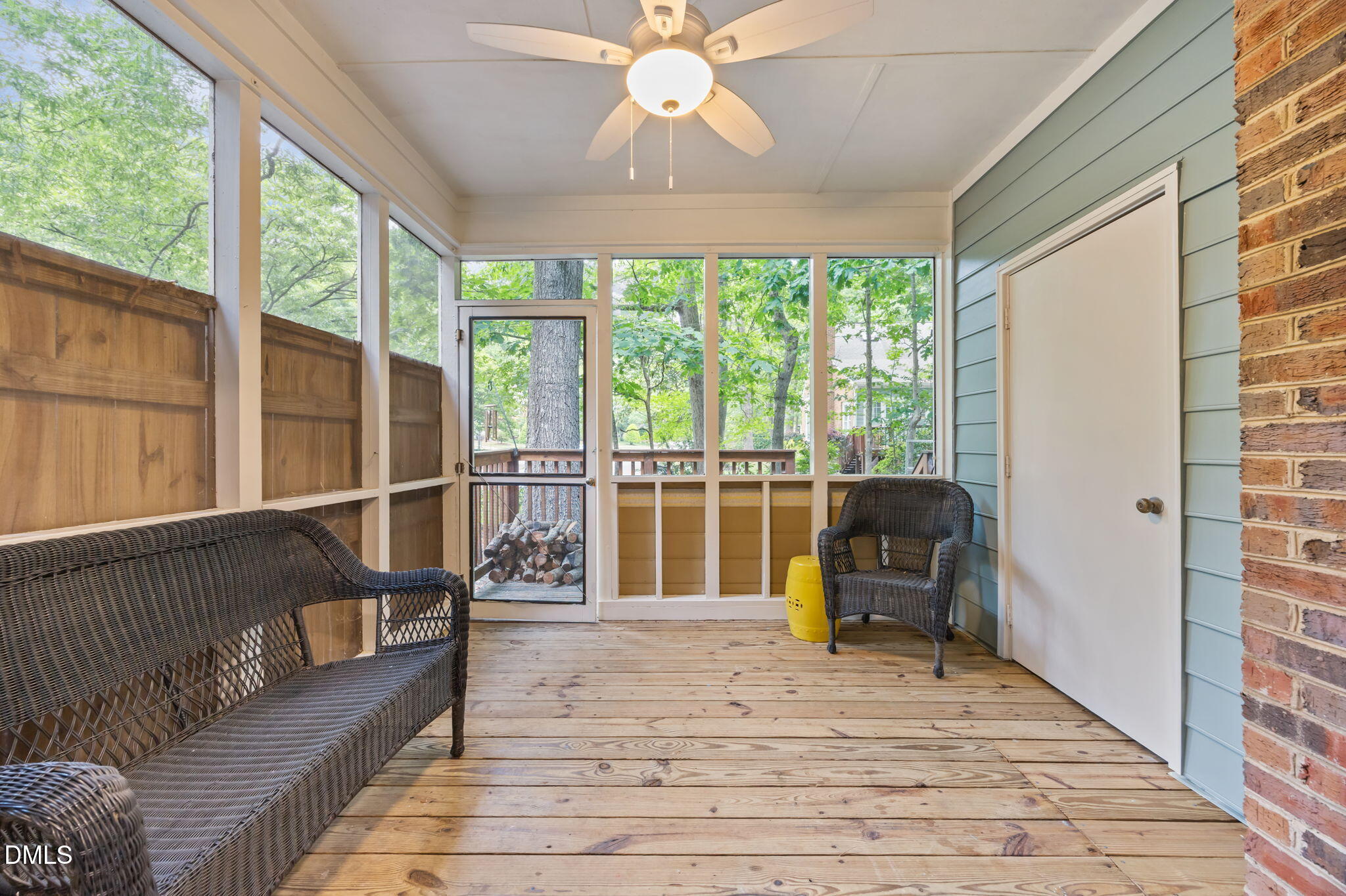562 Weathergreen Drive Raleigh, NC 27615 - Photo 30 of 47 a living room with large windows with a dining table and chairs