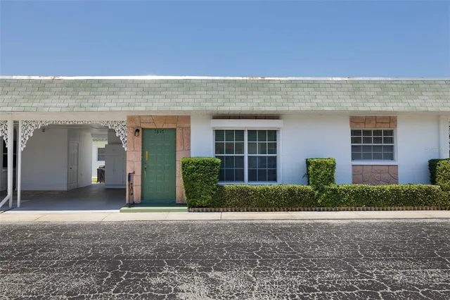 a view of a house with a swimming pool