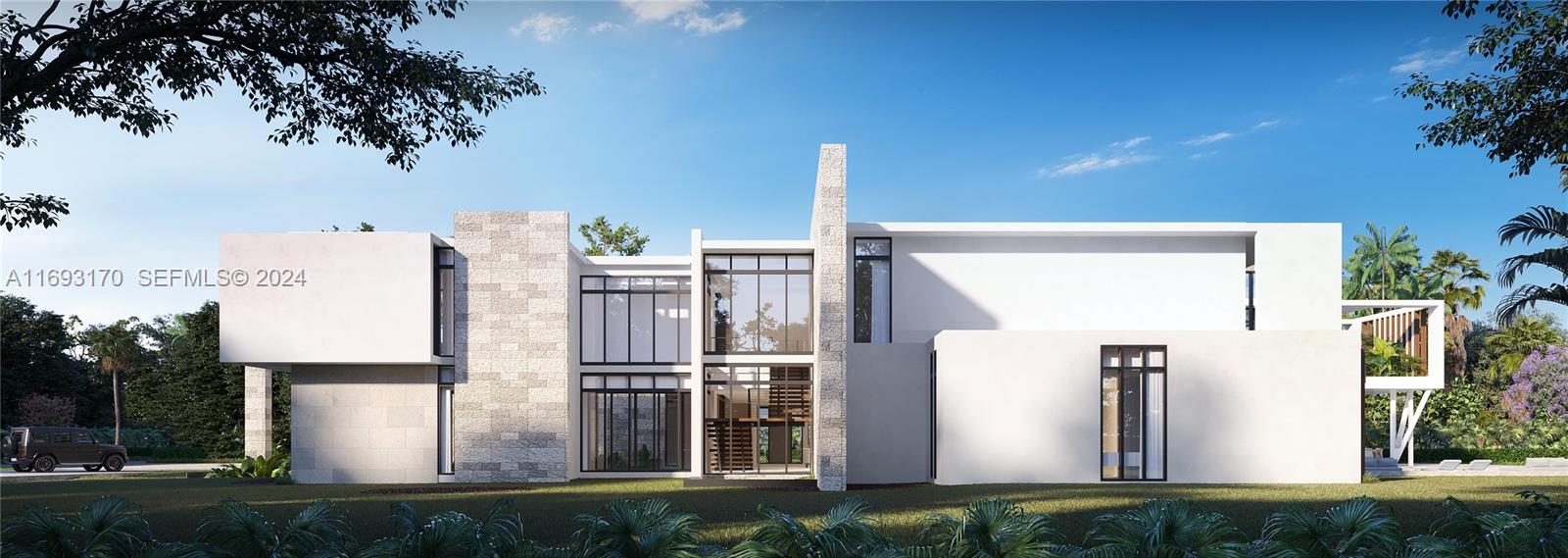 6058 Southwest 120th Street Pinecrest, FL 33156 - Photo 12 of 18 a view of a house with backyard