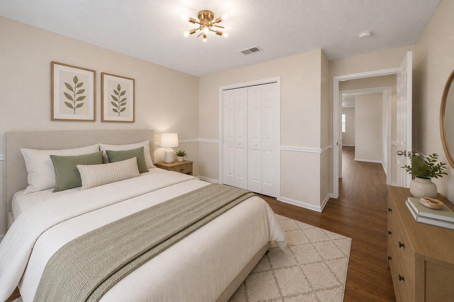 4818 Quailgate Drive Spring, TX 77373 - Photo 12 of 26 a bedroom with a large bed and a chandelier