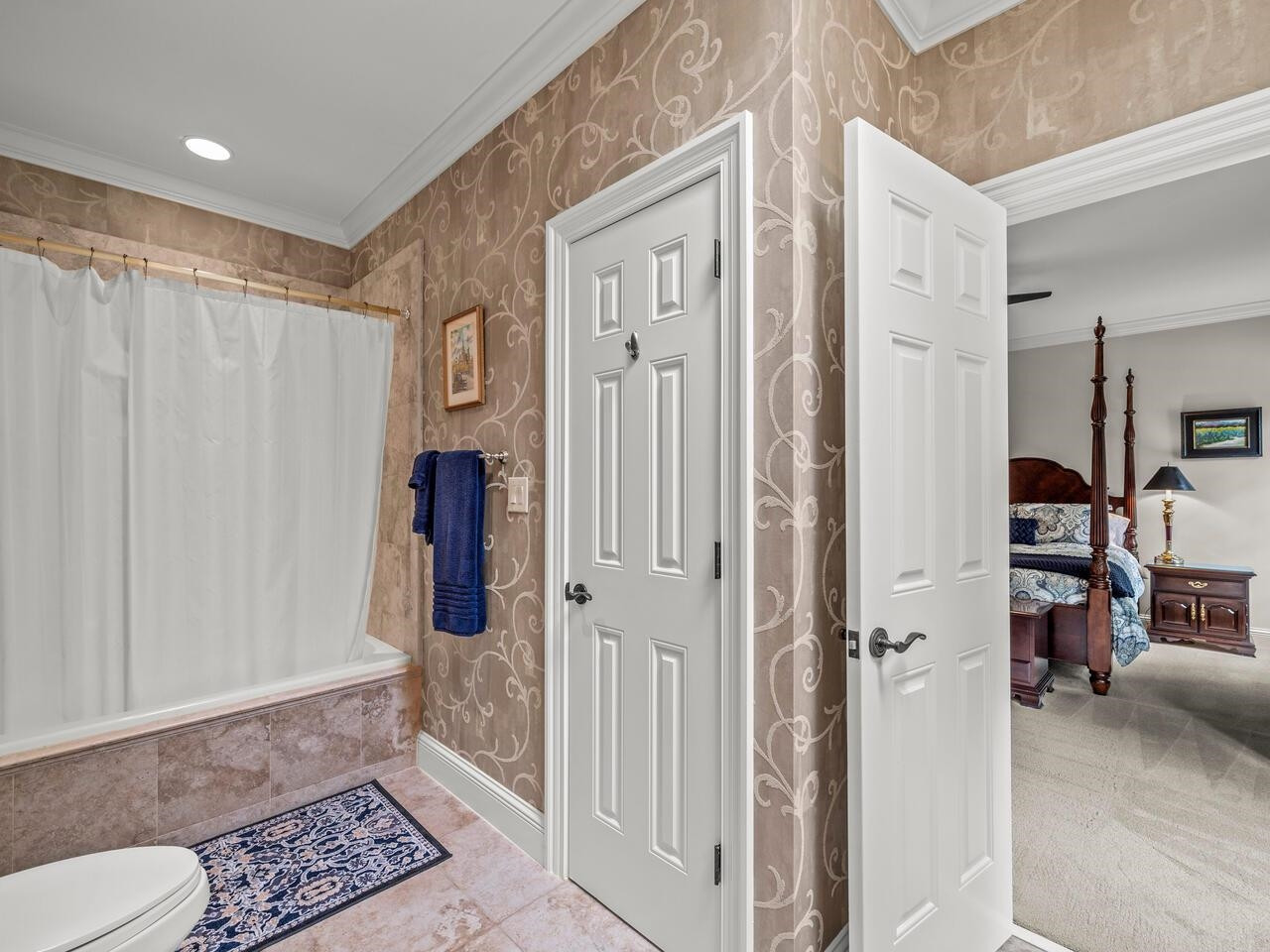 11216 Jonas Ridge Lane Raleigh, NC 27613 - Photo 39 of 75 a bathroom with a shower and a sink