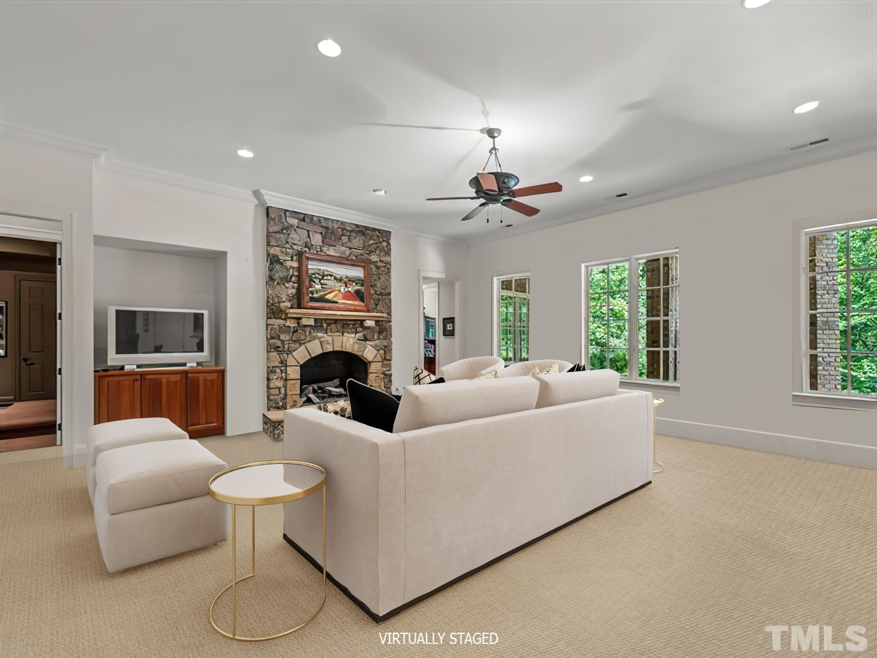 11216 Jonas Ridge Lane Raleigh, NC 27613 - Photo 52 of 75 a living room with furniture a fireplace and a flat screen tv