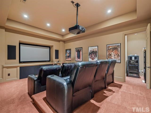 11216 Jonas Ridge Lane Raleigh, NC 27613 - Photo 59 of 75 a living room with furniture a ceiling fan and a rug