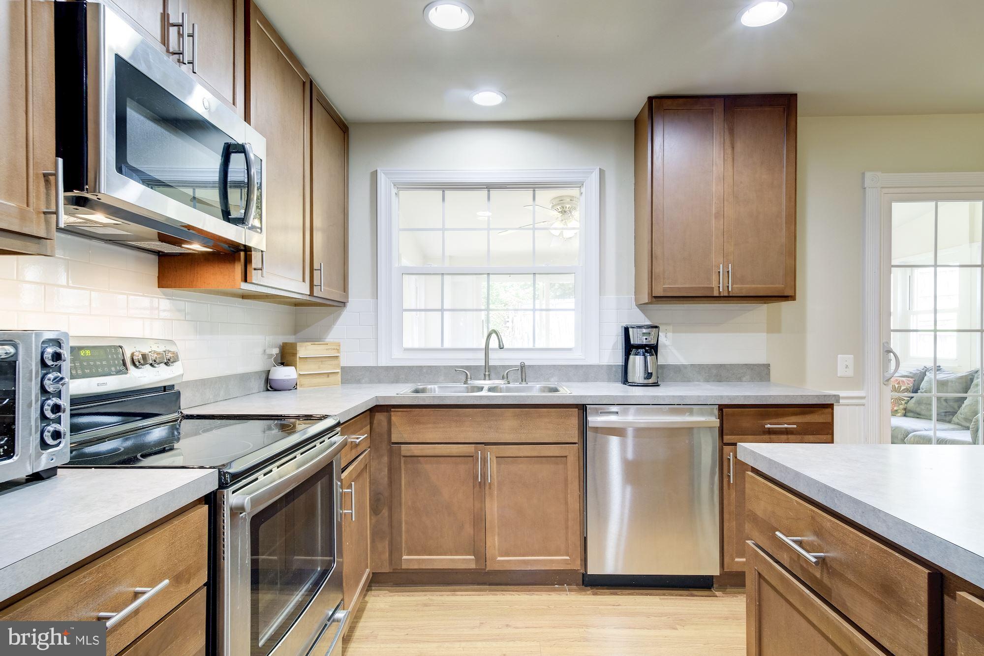 Kitchen with stainless-steel appliances.