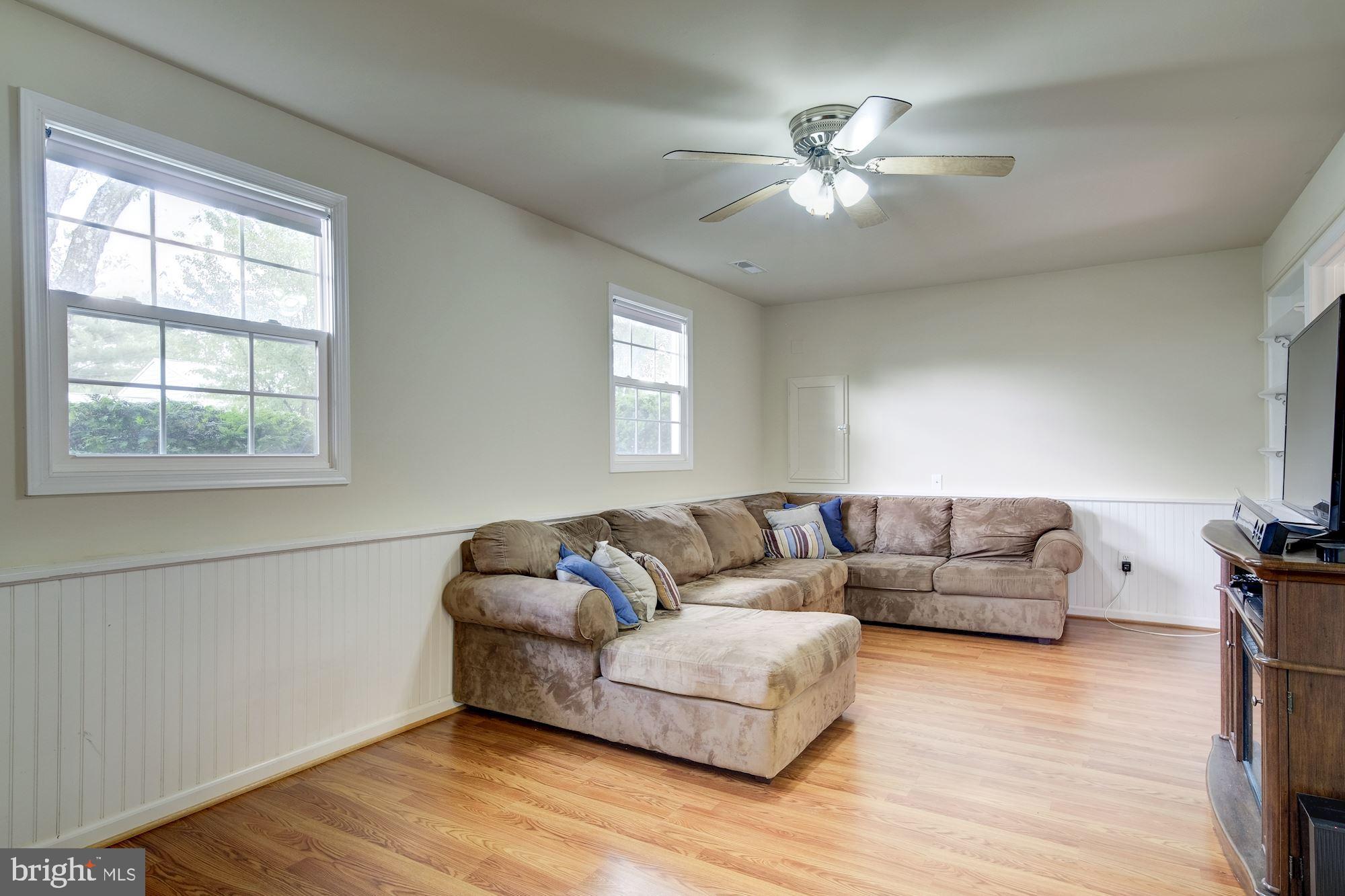 115 Applecreek Road Frederick, MD 21702 - Photo 26 of 33 Family room with wainscoting and fresh paint.