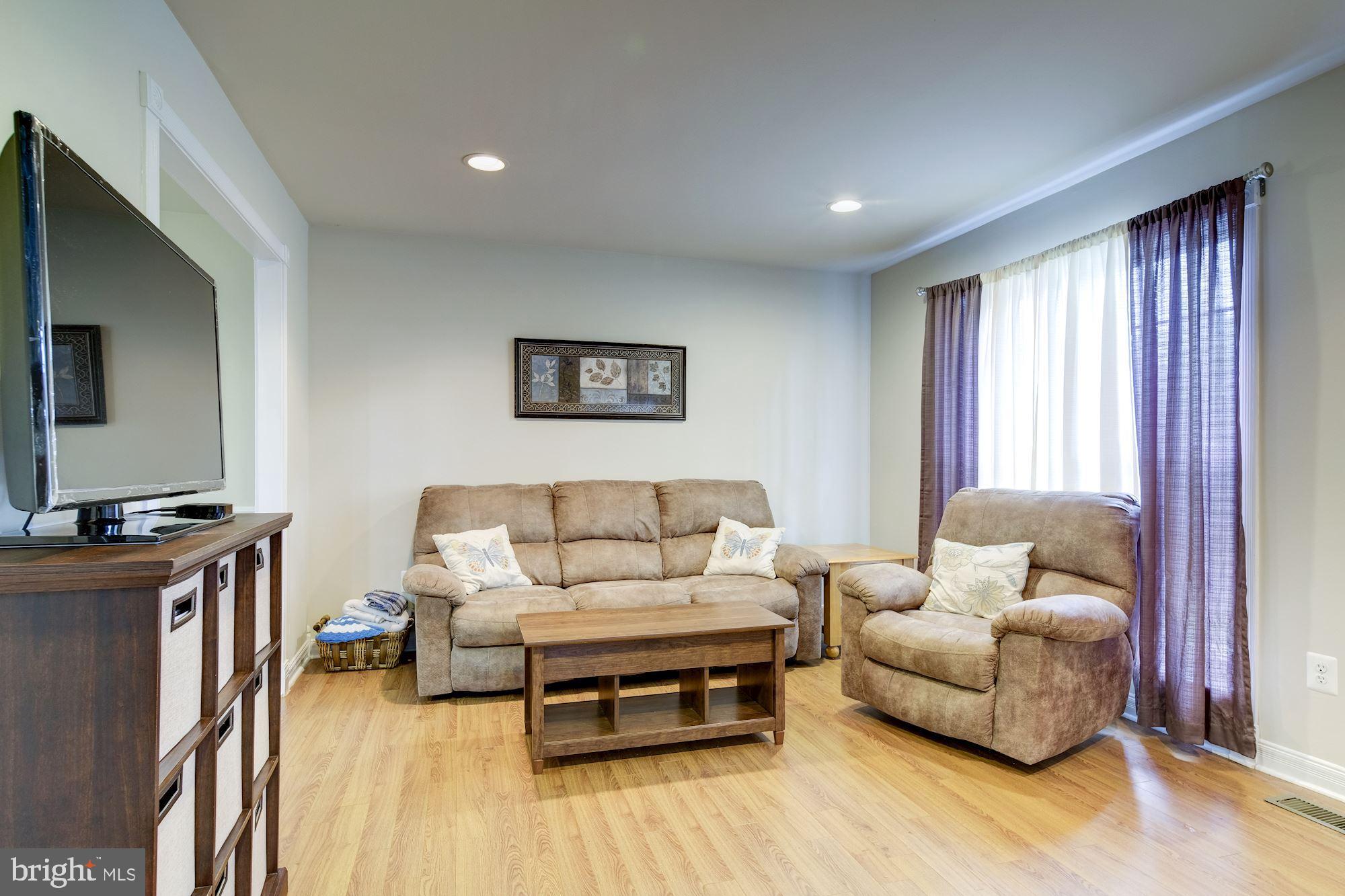 Plenty of natural light and recessed lights.