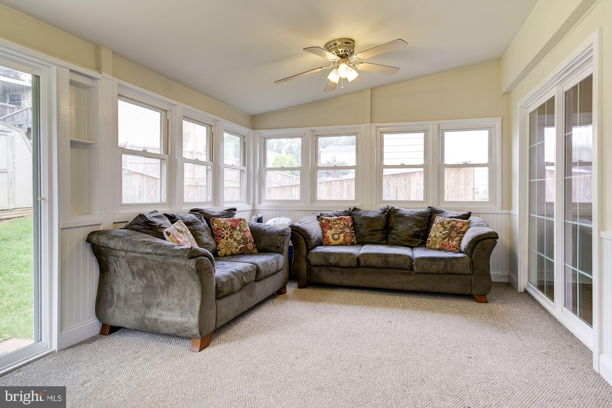 Sun room with New screens in the windows.