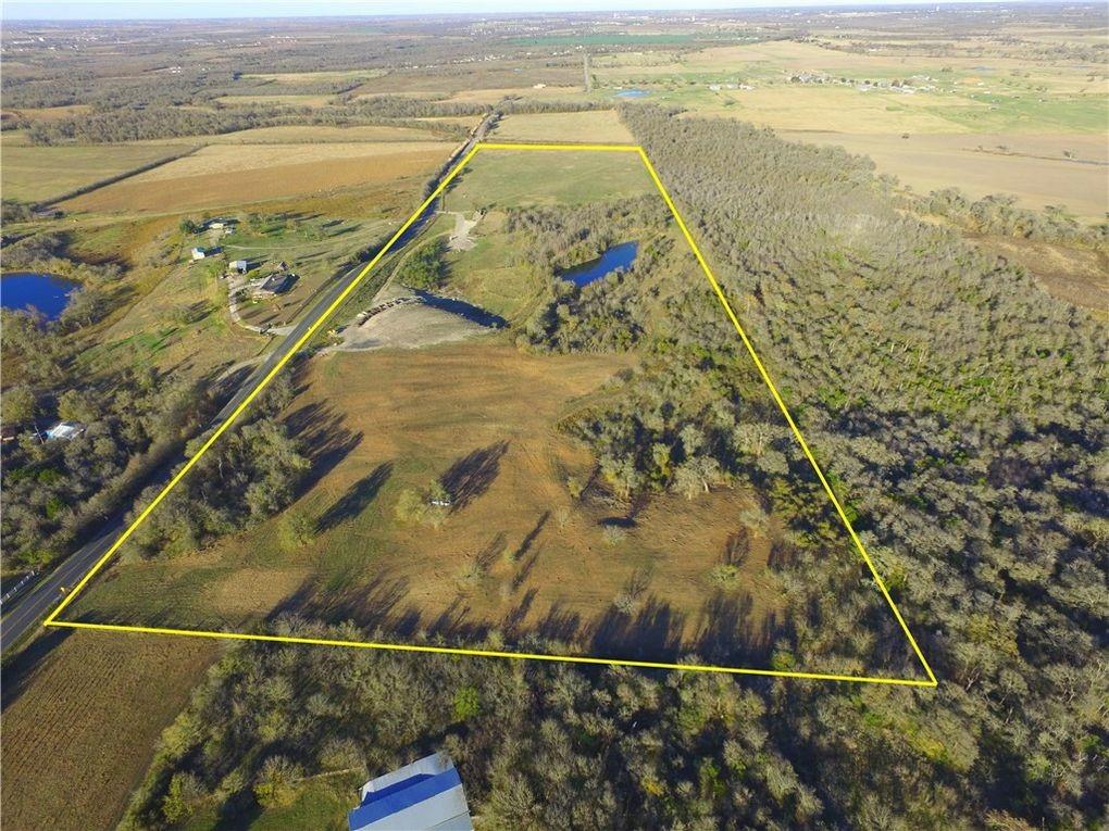 10521 Bitting School Road Manor, TX 78653 - Photo 4 of 13 View of rural area featuring property boundaries highlighted and a nearby body of water