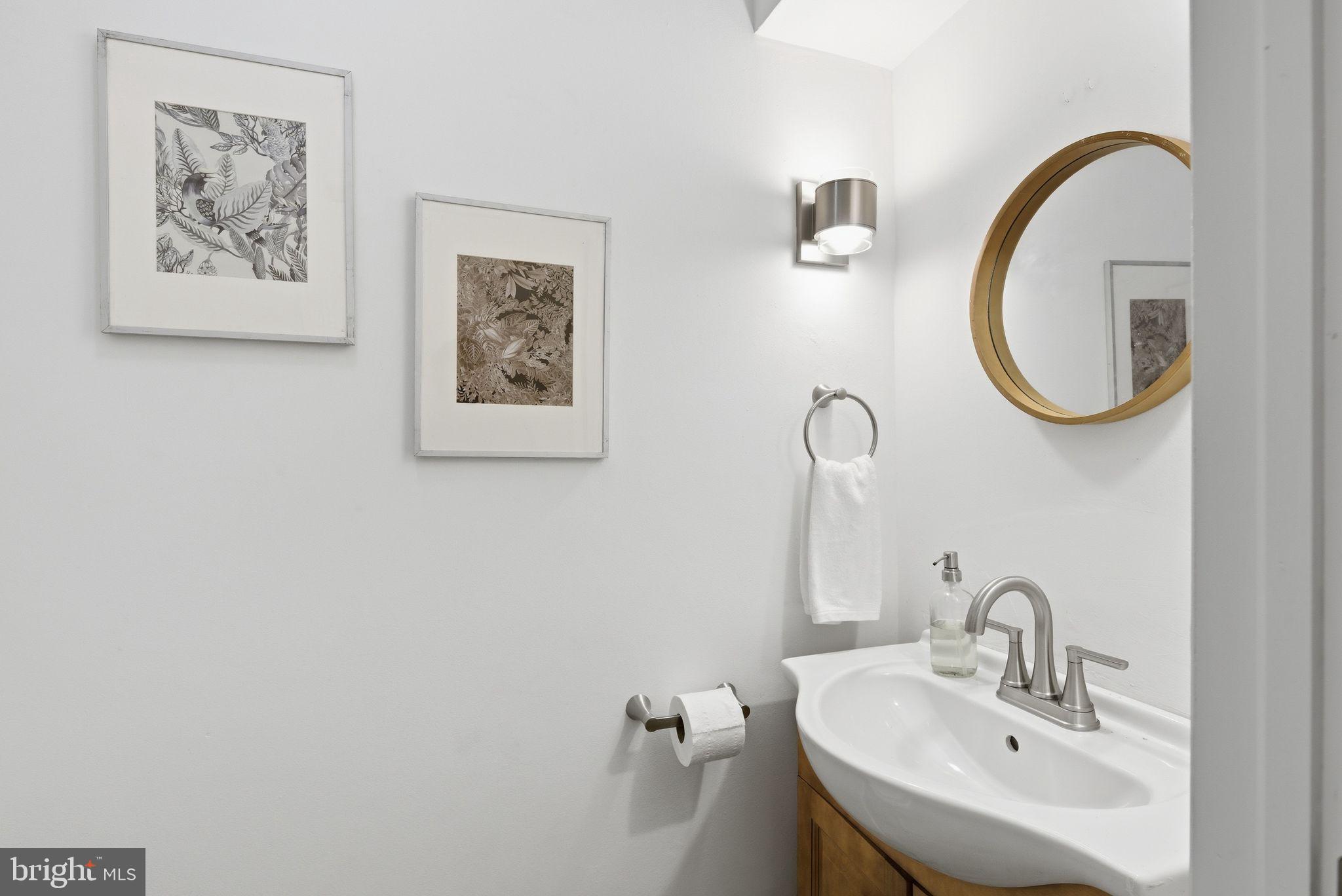5 Brookside Circle Wayne, PA 19087 - Photo 14 of 49 a bathroom with a sink and a mirror
