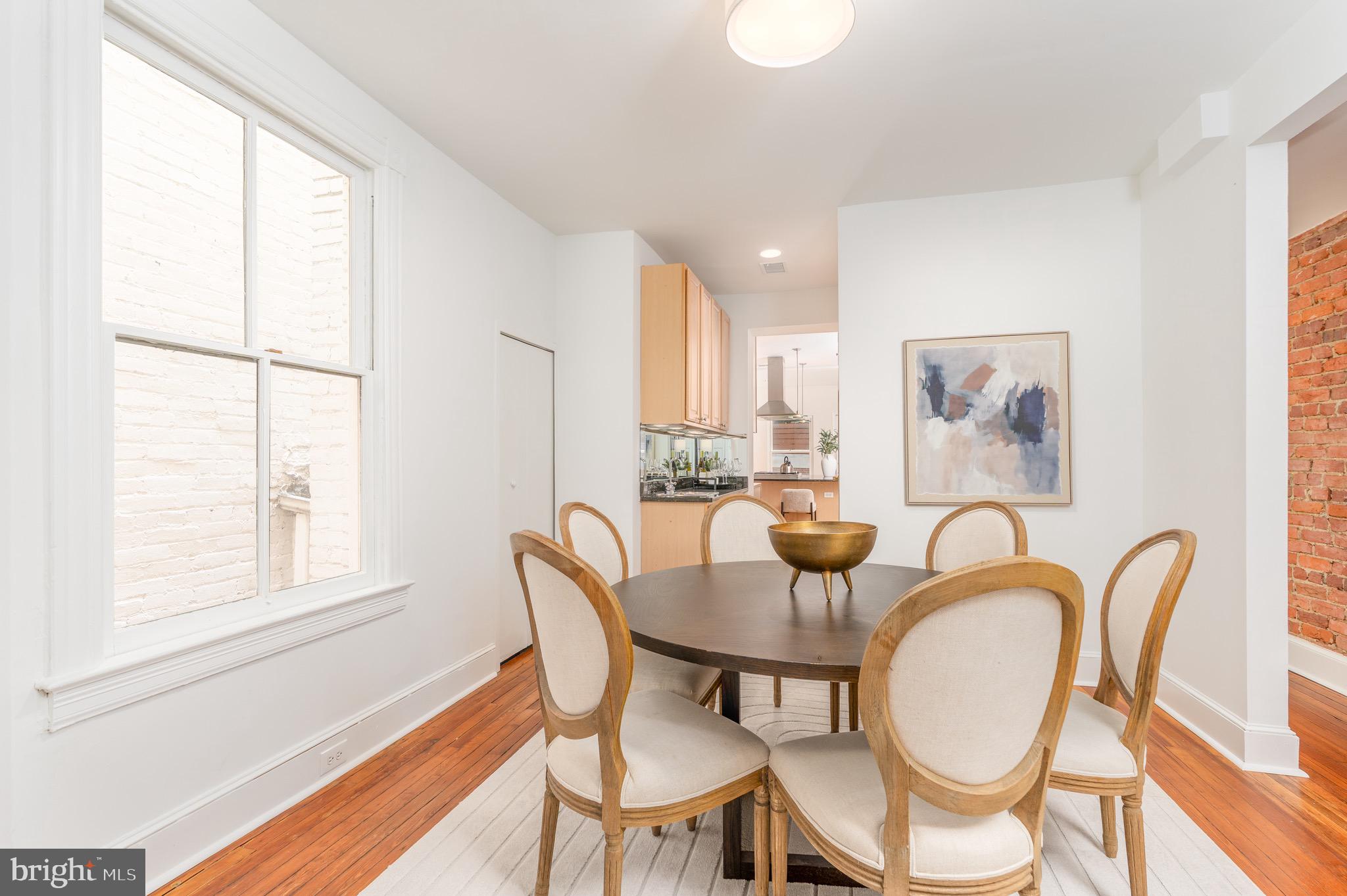 1683 35th Street Northwest, Unit A Washington, DC 20007 - Photo 8 of 26 a dining room with furniture and window