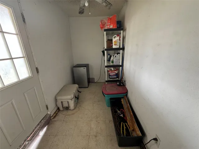 a view of a backyard with sitting area