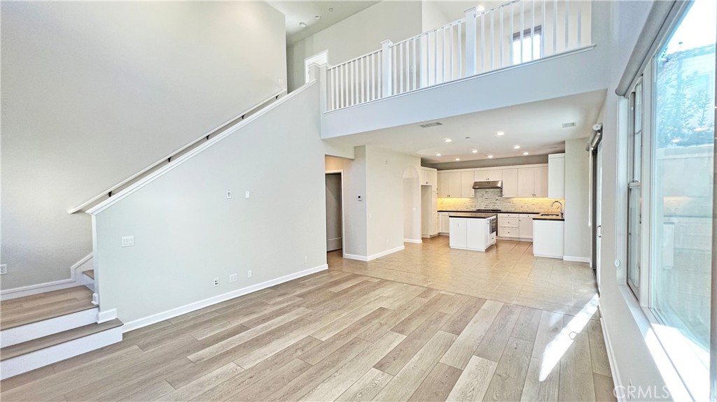 133 Copeland Irvine, CA 92618 - Photo 5 of 18 a view of a kitchen with a sink and cabinets
