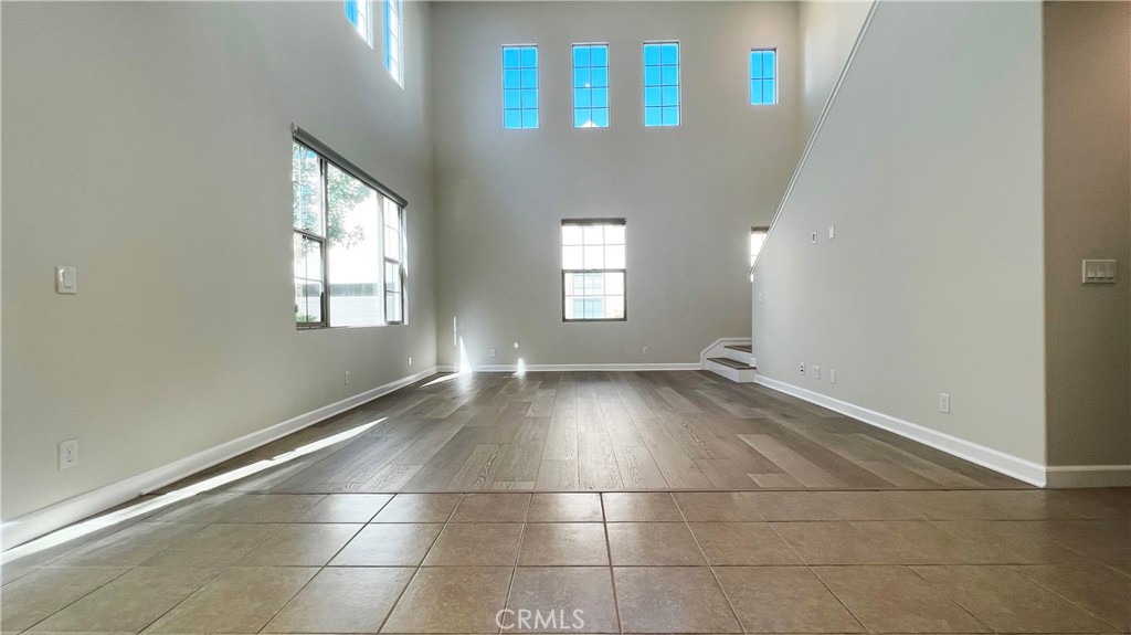 133 Copeland Irvine, CA 92618 - Photo 7 of 18 a view of an empty room with a window