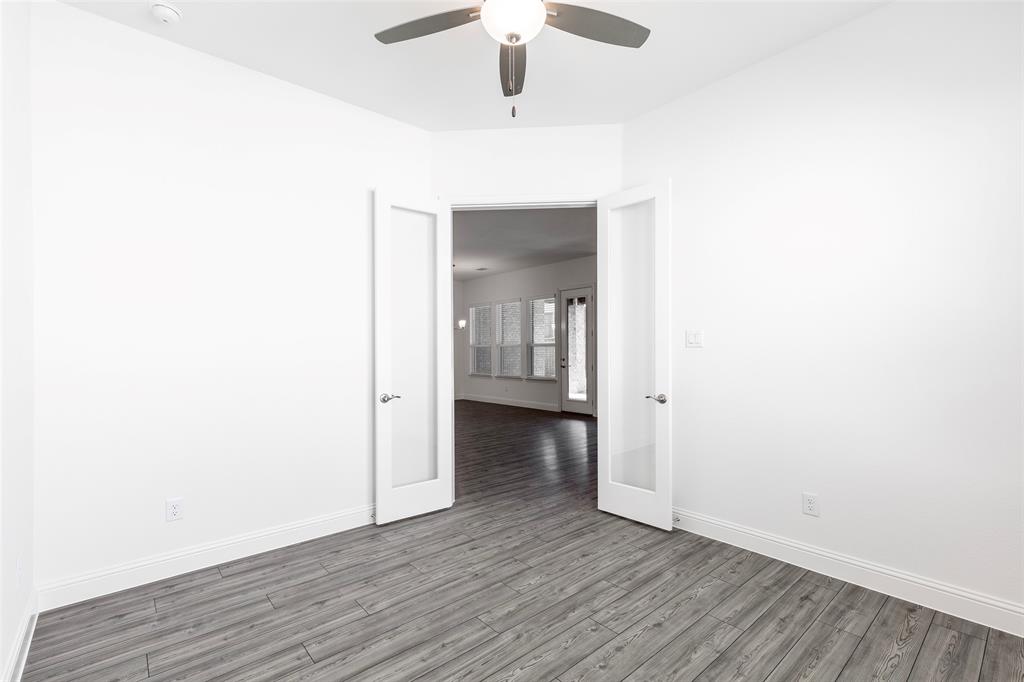 3207 Malcolm Road Melissa, TX 75454 - Photo 19 of 40 a view of an empty room with wooden floor