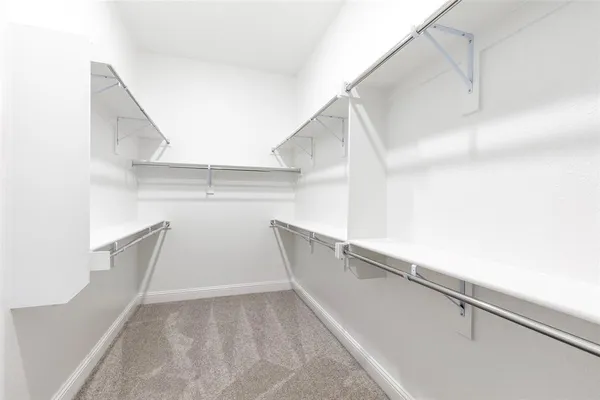 a view of entryway and kitchen