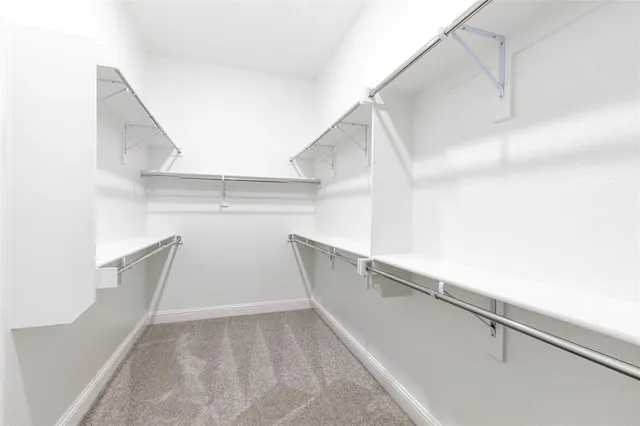 a view of entryway and kitchen