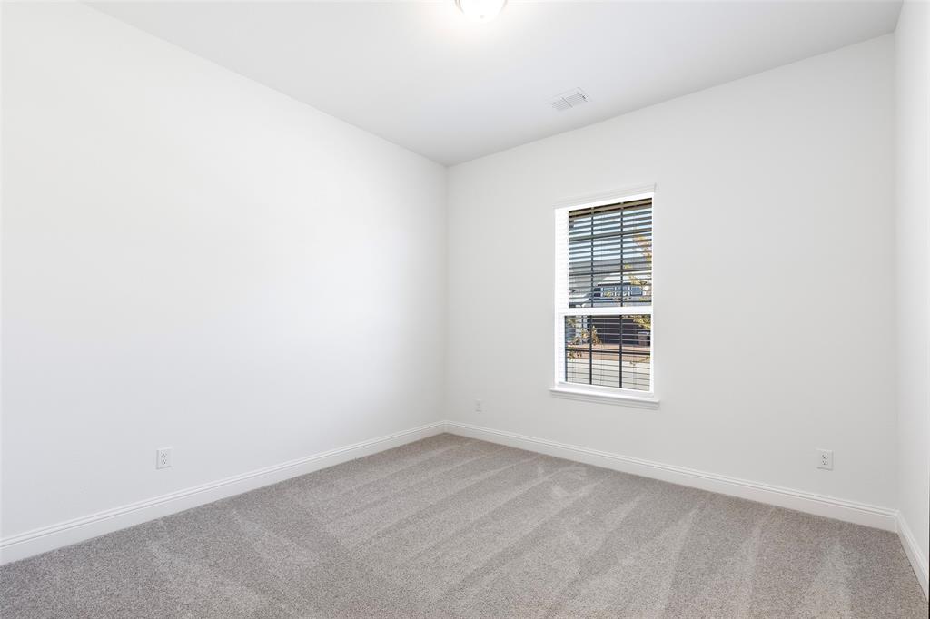 3207 Malcolm Road Melissa, TX 75454 - Photo 32 of 40 an empty room with a window