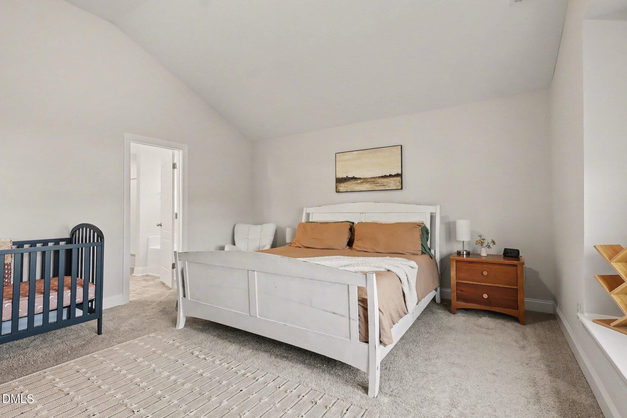 190 Stephens Timberline View Clayton, NC 27520 - Photo 23 of 42 a bed room with a bed and a baby crib