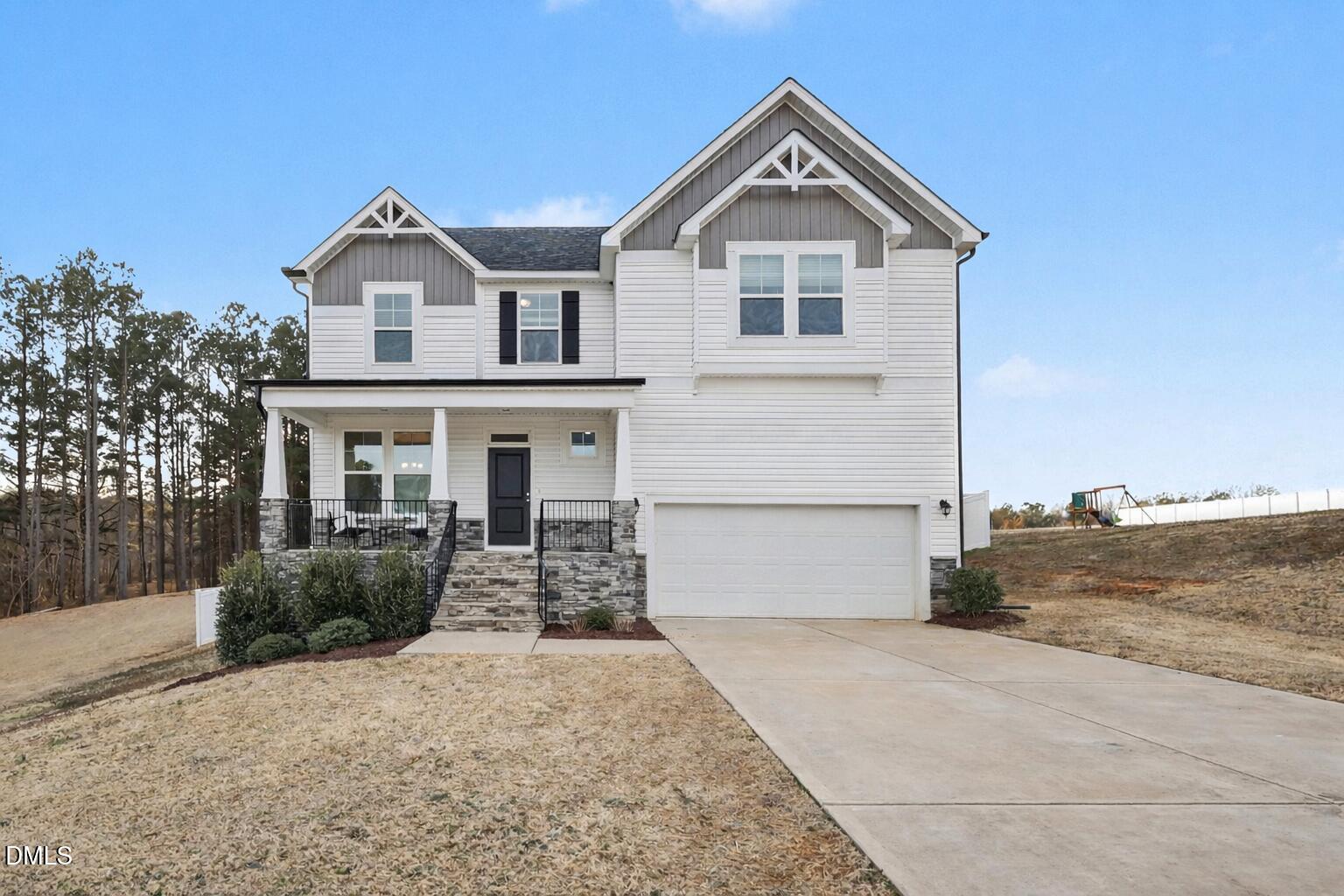 190 Stephens Timberline View Clayton, NC 27520 - Photo 2 of 42 a front view of a house with garden
