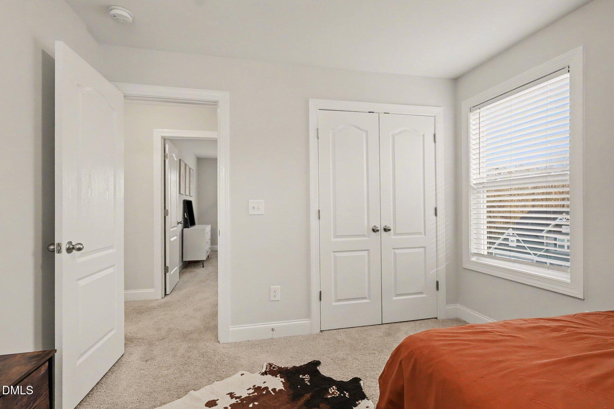 190 Stephens Timberline View Clayton, NC 27520 - Photo 28 of 42 a bedroom with a bed and a window