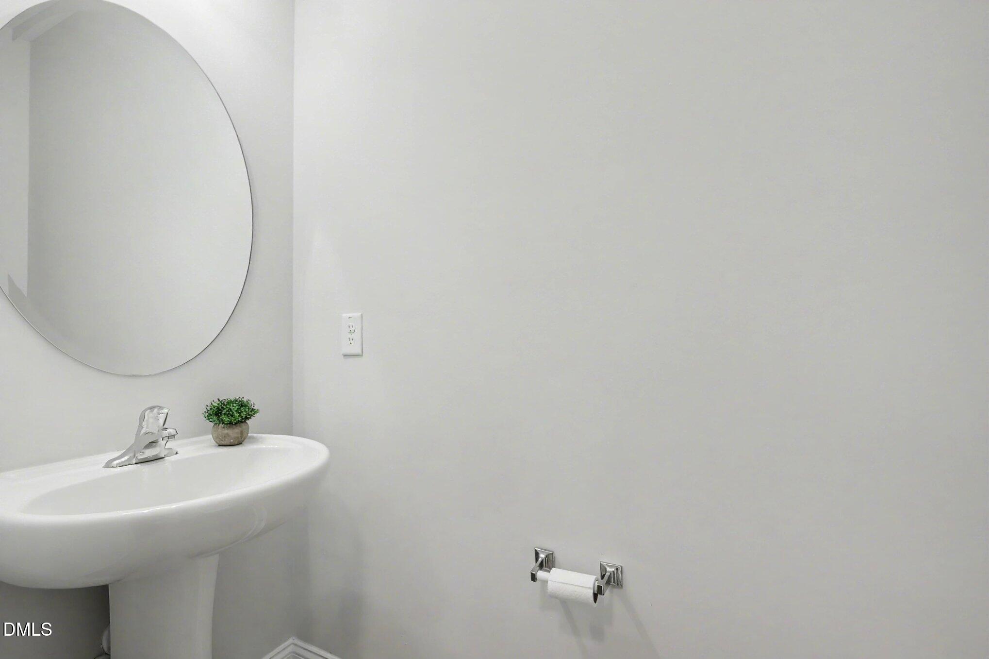 190 Stephens Timberline View Clayton, NC 27520 - Photo 6 of 42 a bathroom with a sink and a mirror