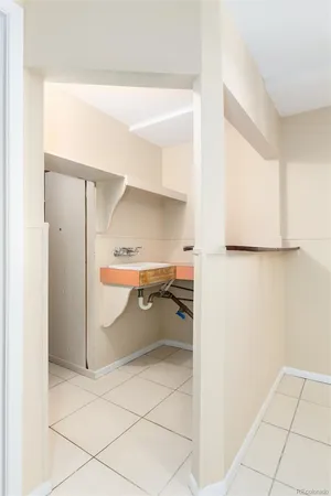 a bathroom with a sink and a shower