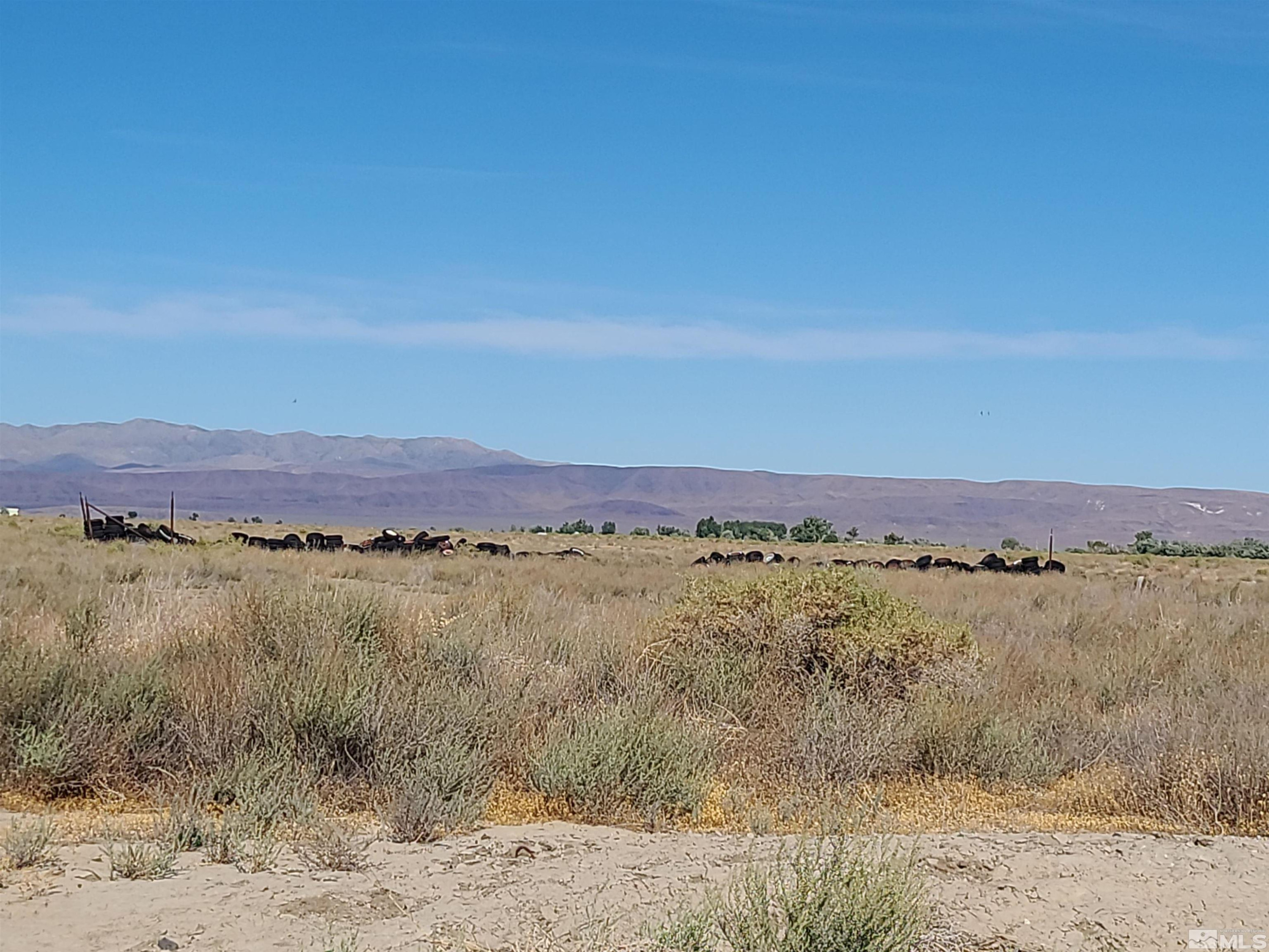 750 Sage Lane, Unit 915405 Fallon, NV 89406 - Photo 6 of 6 a view of lake and mountain