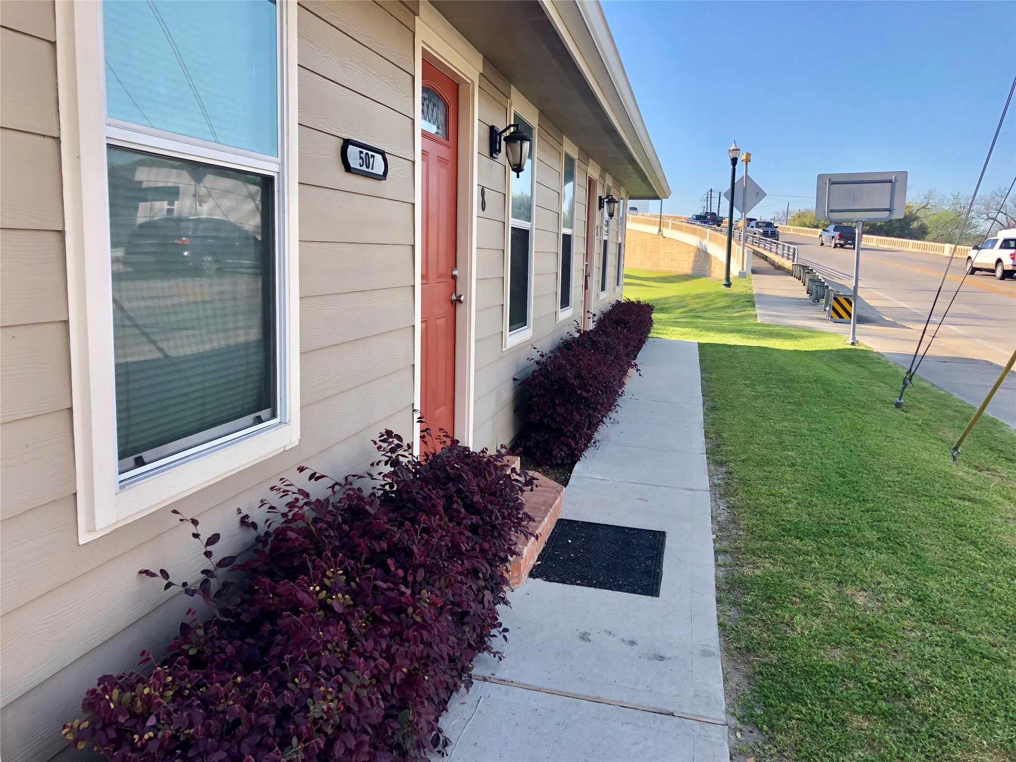507 Houston Street, Unit 8 Rosenberg, TX 77471 - Photo 2 of 21 a view of a back yard of the house