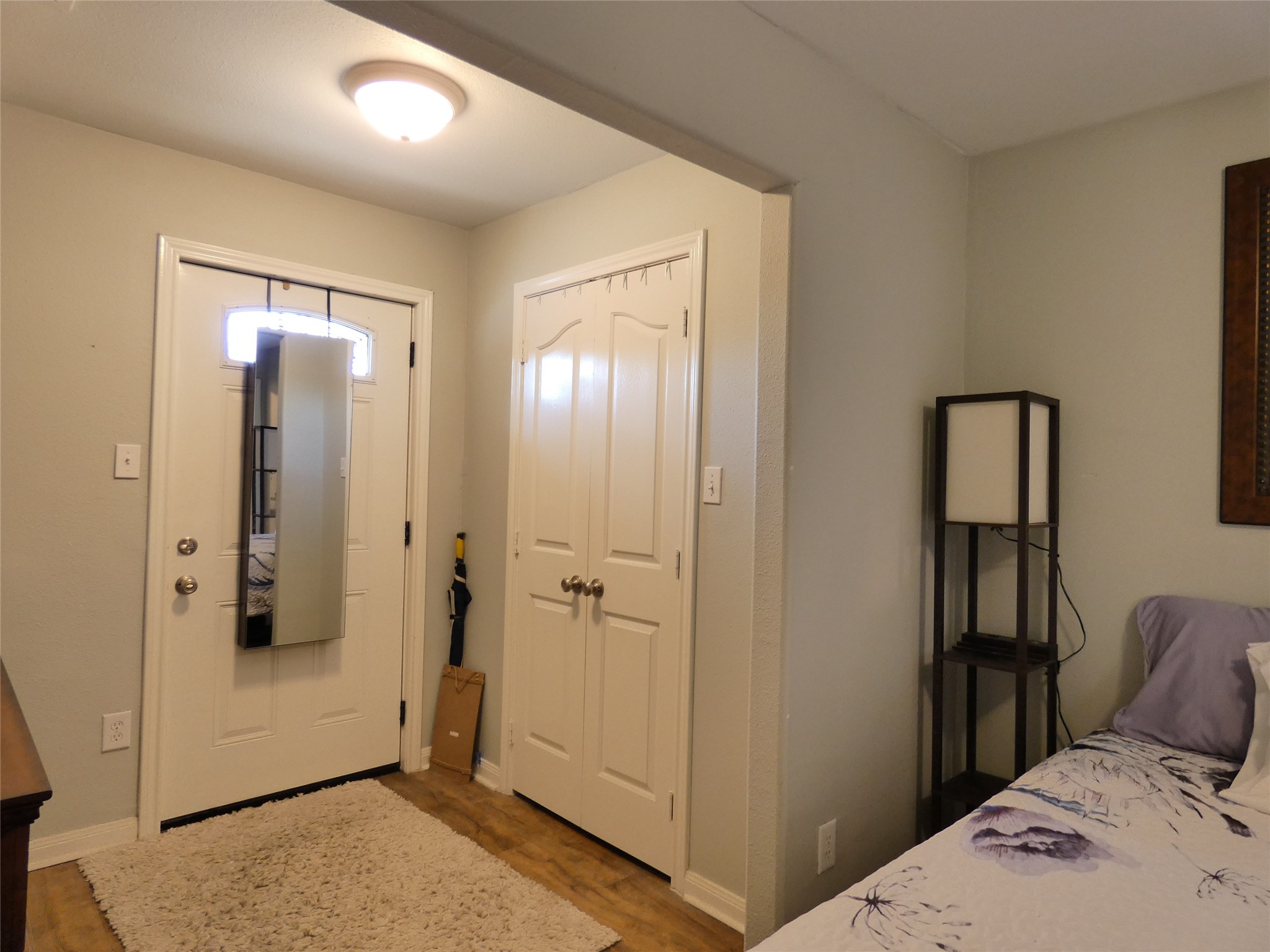 507 Houston Street, Unit 8 Rosenberg, TX 77471 - Photo 10 of 21 a bedroom with a bed and a shower