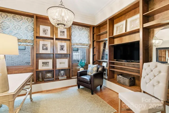 a bathroom with a sink mirror and toilet