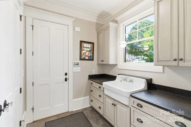 a view of a chairs and tables in the balcony