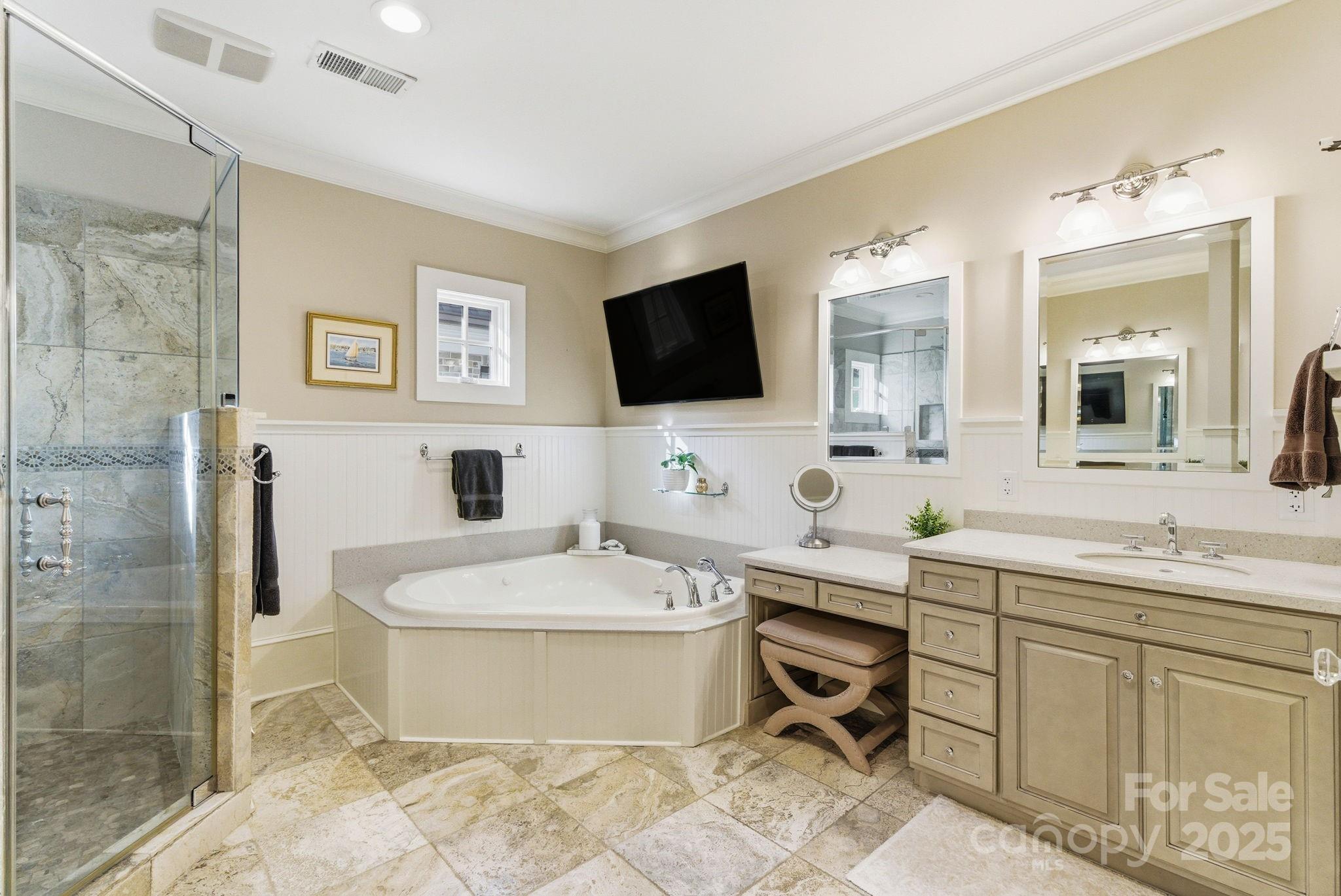 27 Veranda Lane Blythewood, SC 29016 - Photo 24 of 48 a spacious bathroom with a sink a mirror and a shower