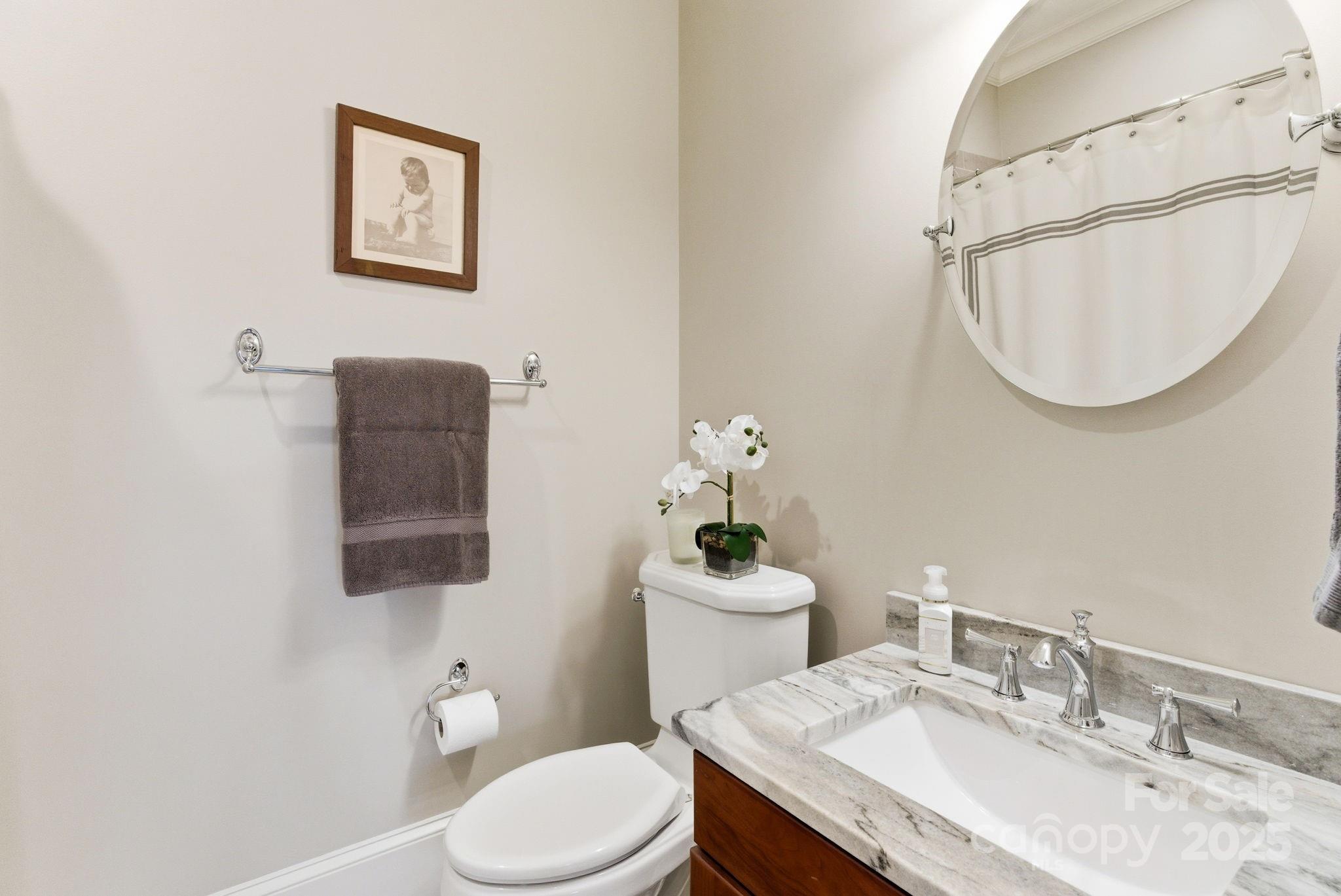 27 Veranda Lane Blythewood, SC 29016 - Photo 27 of 48 a bathroom with a granite countertop toilet sink mirror and vanity