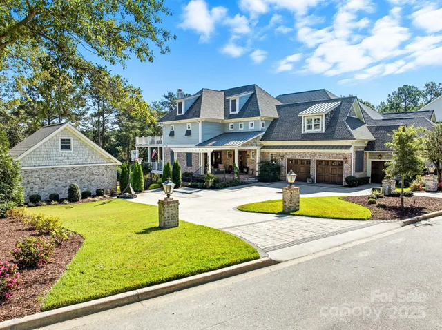 a front view of a house with swimming pool