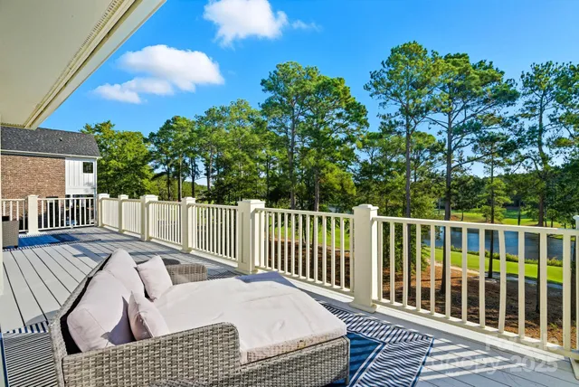 a view of a street with a tree