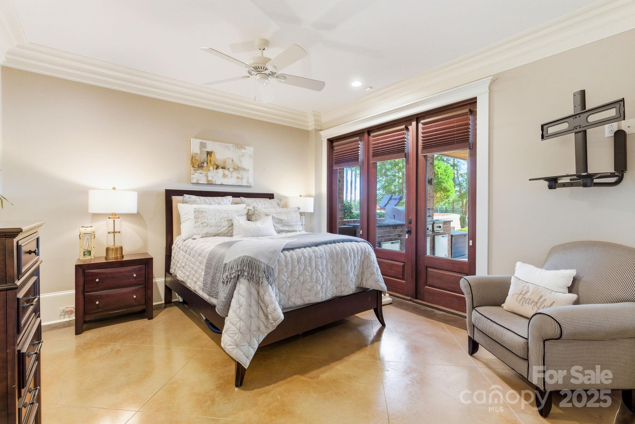 27 Veranda Lane Blythewood, SC 29016 - Photo 39 of 48 a spacious bedroom with a bed couch and a window