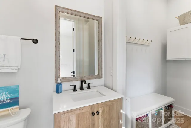 an aerial view of a house with a swimming pool patio and outdoor seating