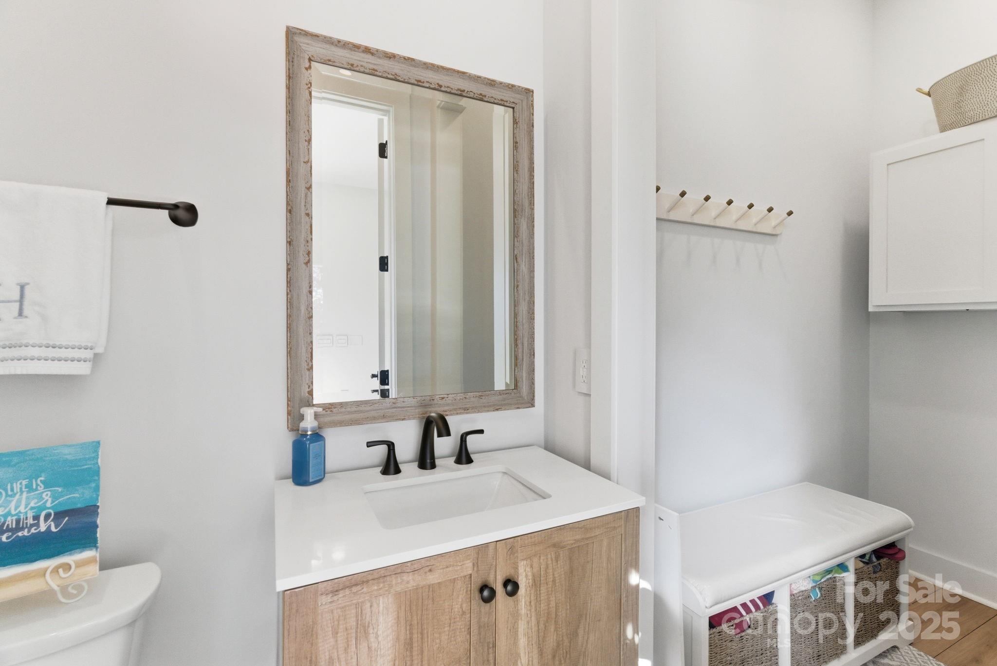27 Veranda Lane Blythewood, SC 29016 - Photo 47 of 48 a bathroom with a sink and a mirror