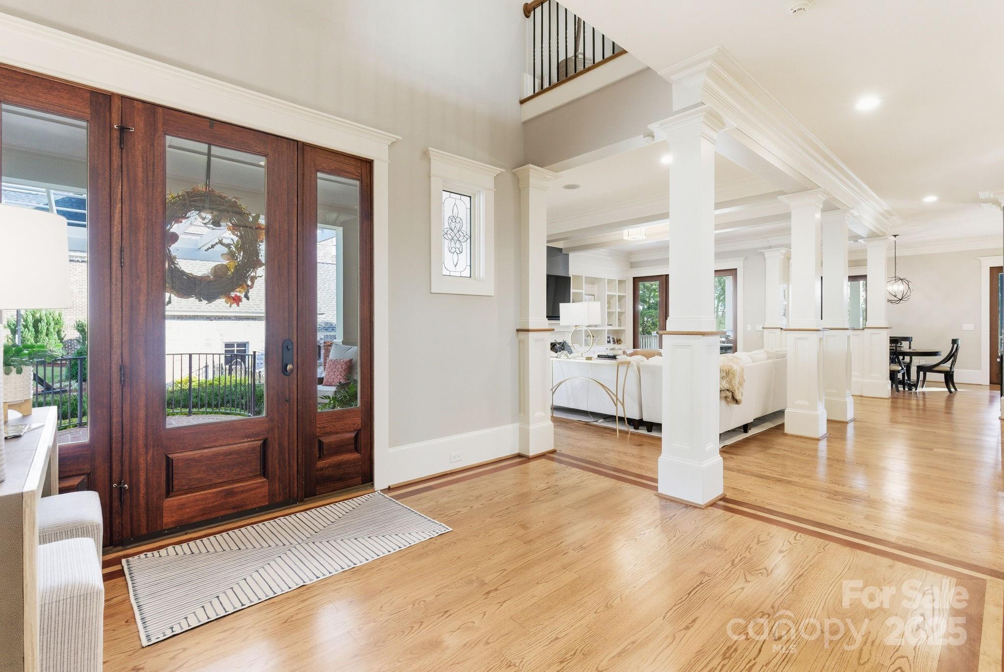 27 Veranda Lane Blythewood, SC 29016 - Photo 5 of 48 a view of a livingroom with furniture wooden floor and a chandelier