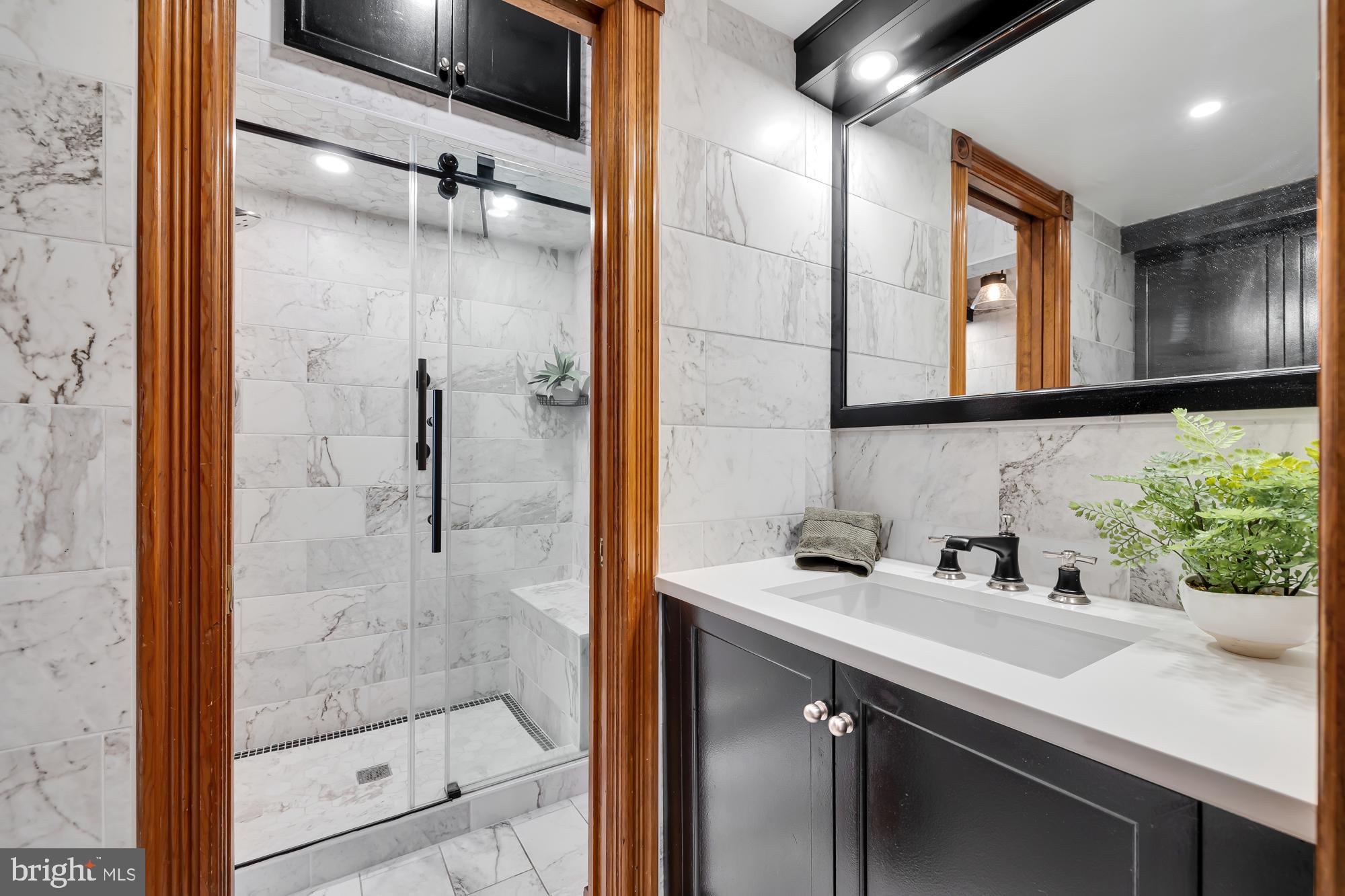 311 6th Street Southeast, Unit 3 Washington, DC 20003 - Photo 19 of 30 Powder Room with Door into Bathroom