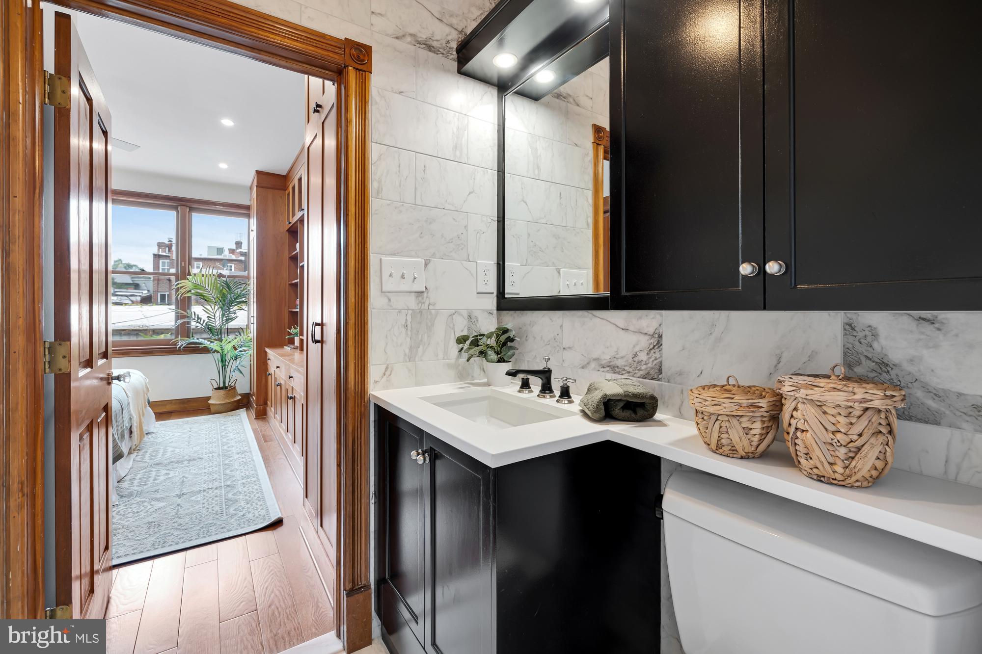 311 6th Street Southeast, Unit 3 Washington, DC 20003 - Photo 22 of 30 View from Bath into Primary Bedroom